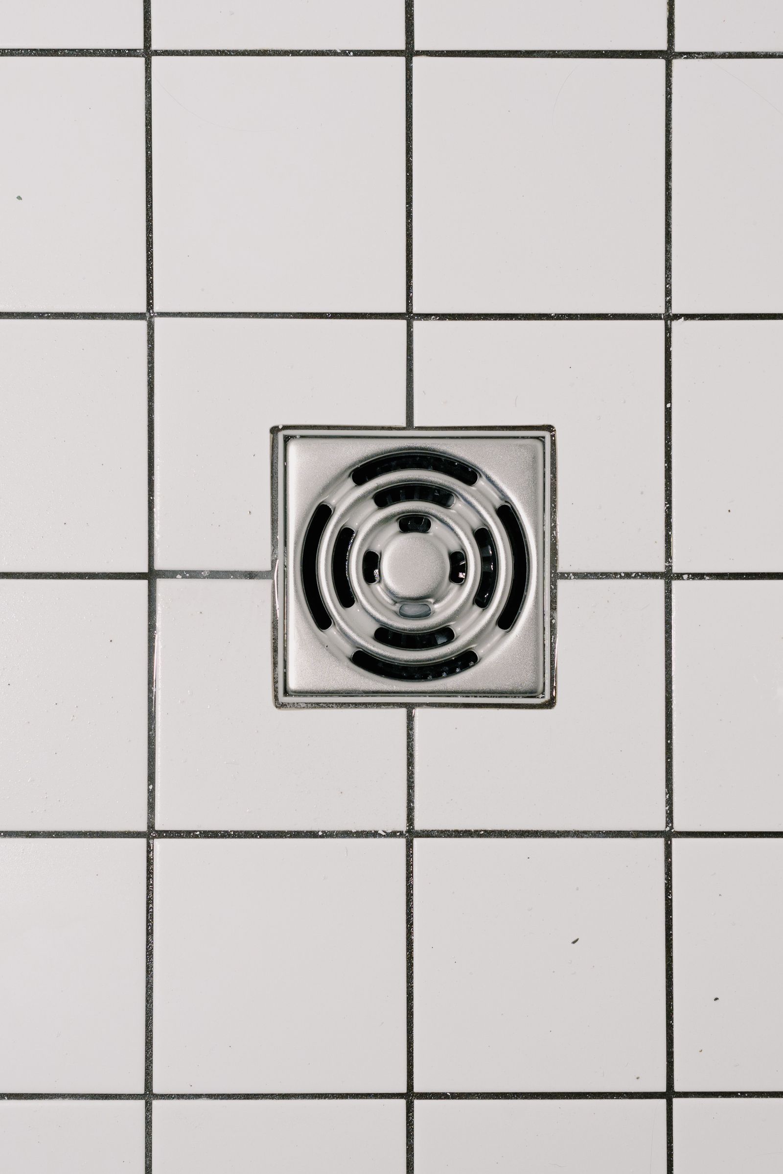 Silicone shower drain cover catching hair